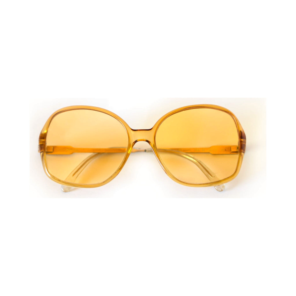 AMBER Sunglasses - oversized translucent honey frame with golden lenses, front view
