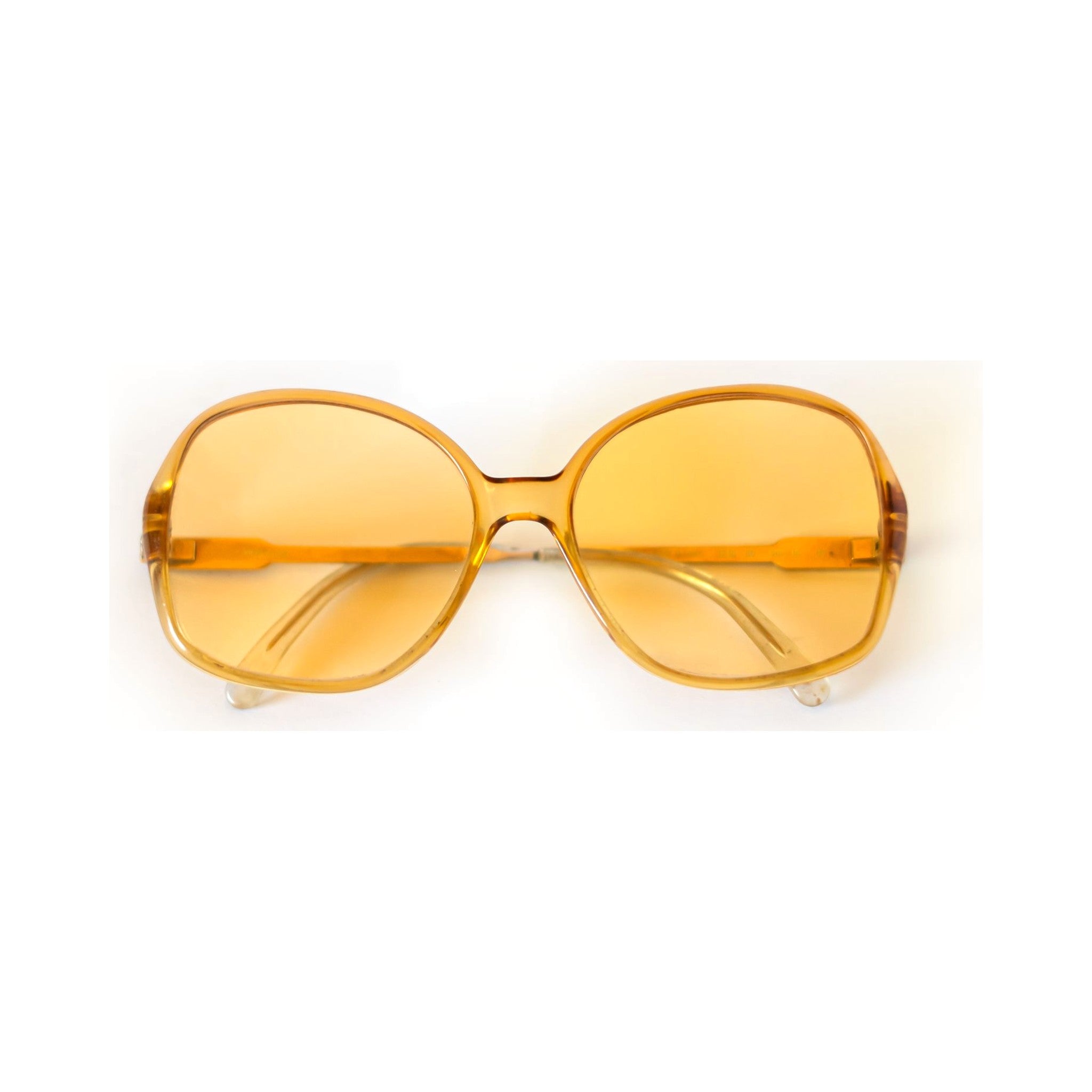 AMBER Sunglasses - oversized translucent honey frame with golden lenses, front view
