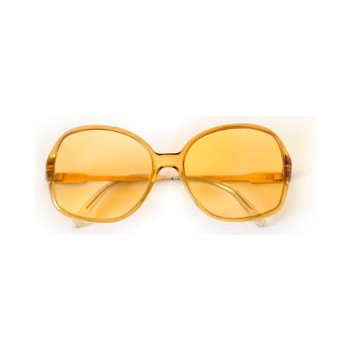 AMBER Sunglasses - oversized translucent honey frame with golden lenses, front view