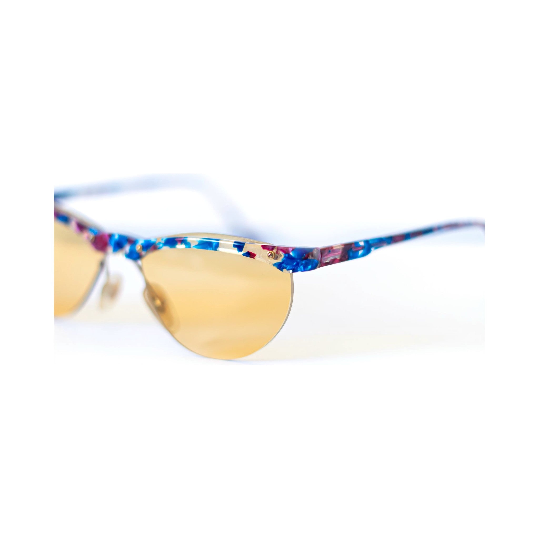 CONFETTI Sunglasses - confetti patterned brow detail, close-up angled view