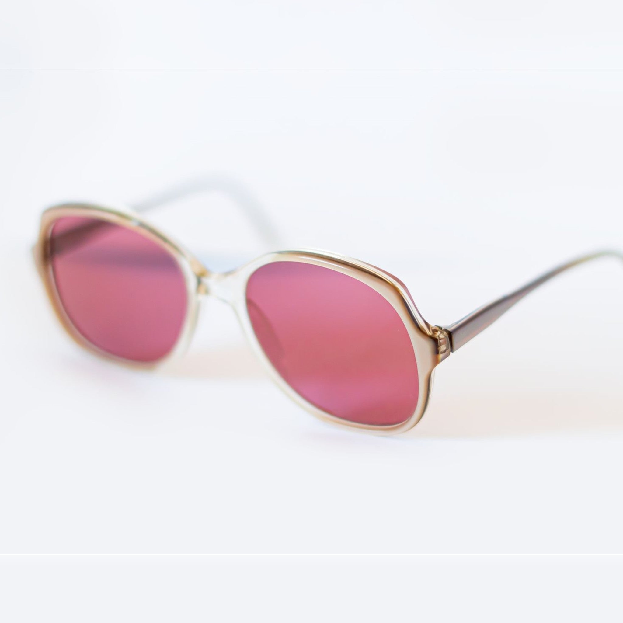 BLUSH Sunglasses - champagne oversized frame, angled view