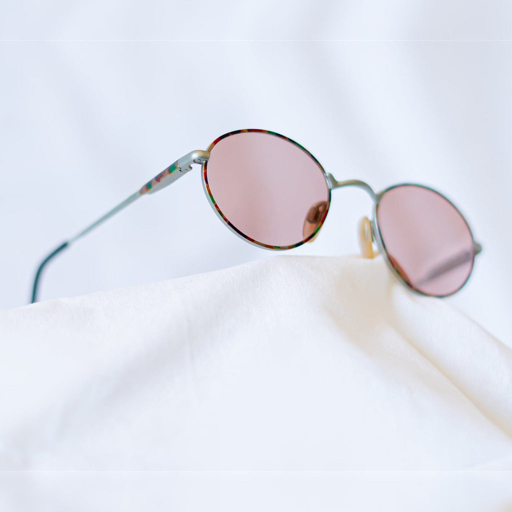 MOSAIC Sunglasses - lifestyle angled view on white fabric