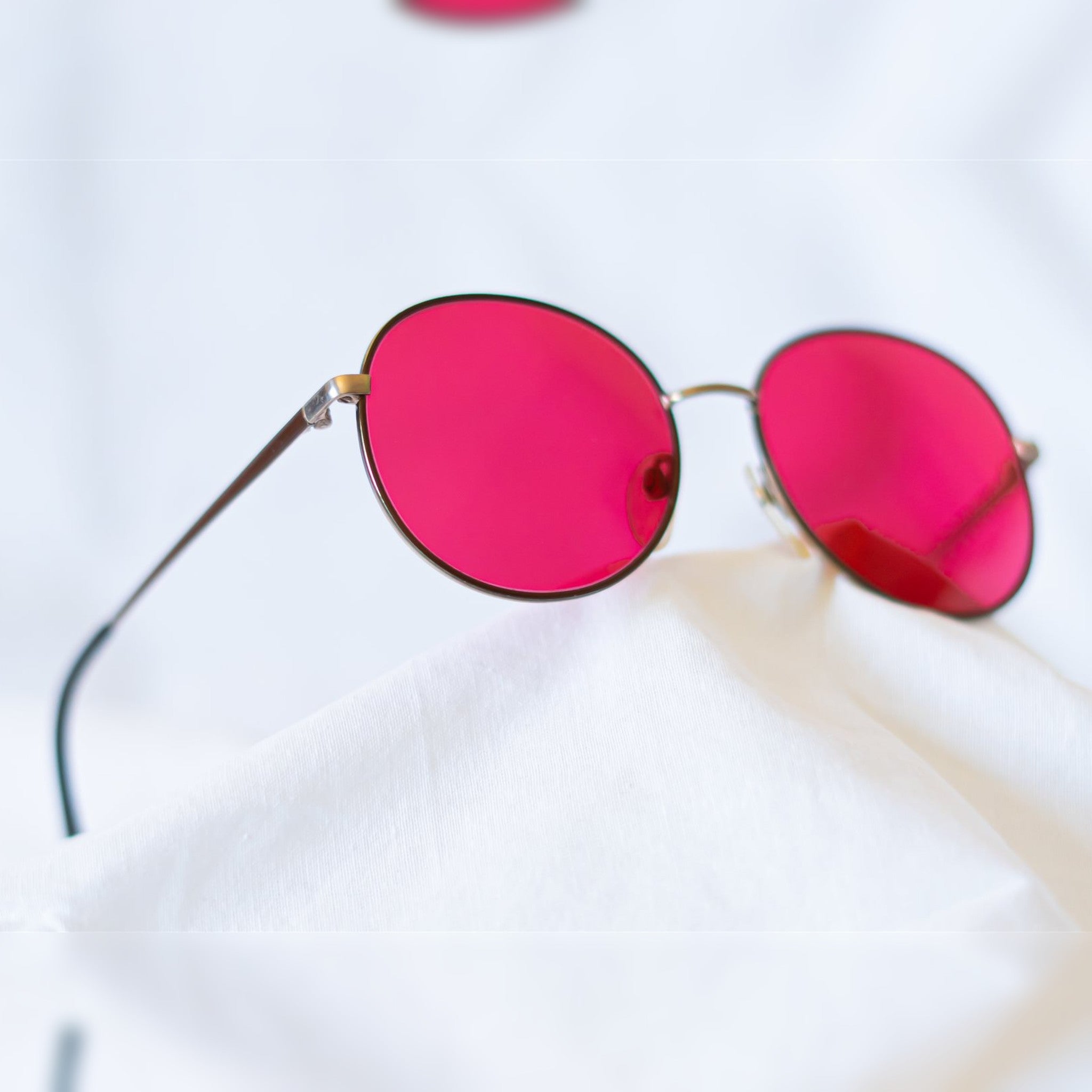 CRIMSON Sunglasses - round silver metal frame with vivid crimson red lenses